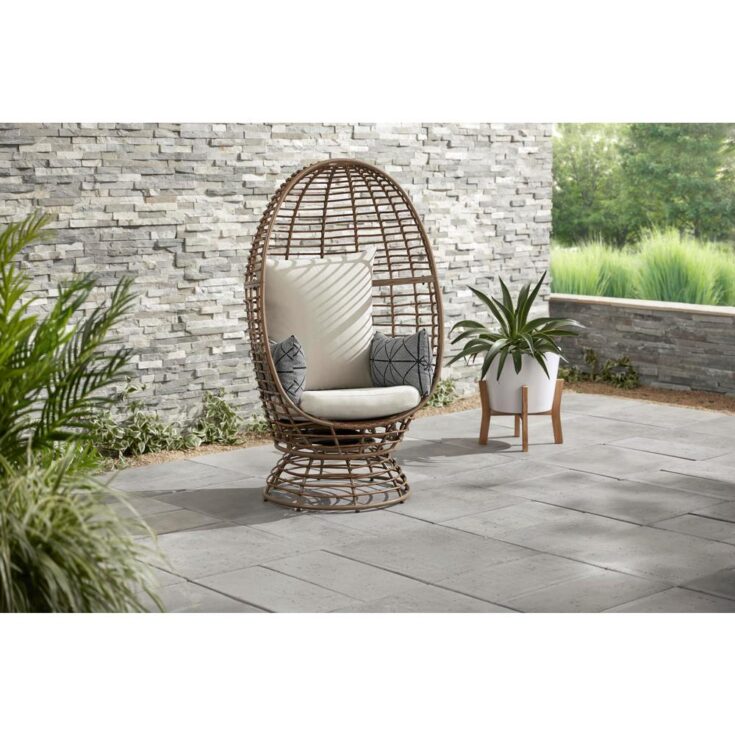 Image for Brown Wicker Outdoor Swivel Patio Egg Lounge Chair with Beige Cushions and Black/Cream Pattern Pillows