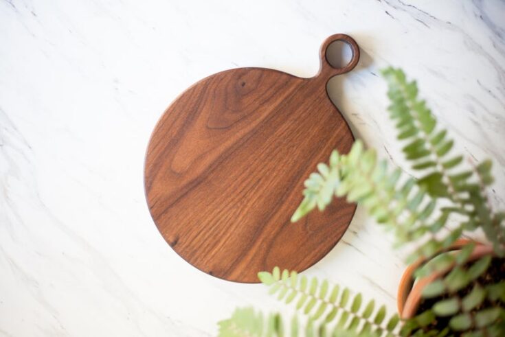 Image for Large Round Wood Walnut Cutting Board with Handle Round