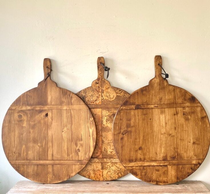 Image for Large Round European Bread Board Hard Carved Bottleneck 