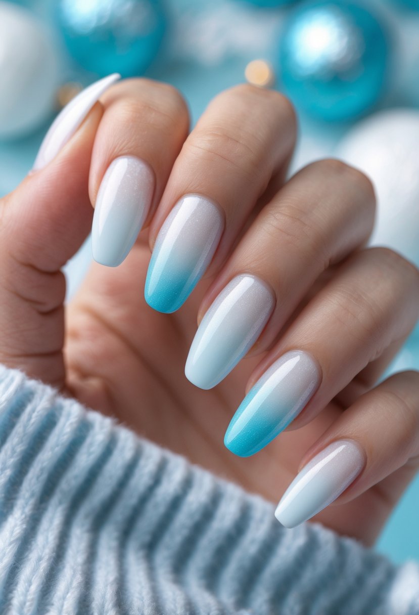 Close-up of a hand with nails painted in a frosted white to light blue gradient.
