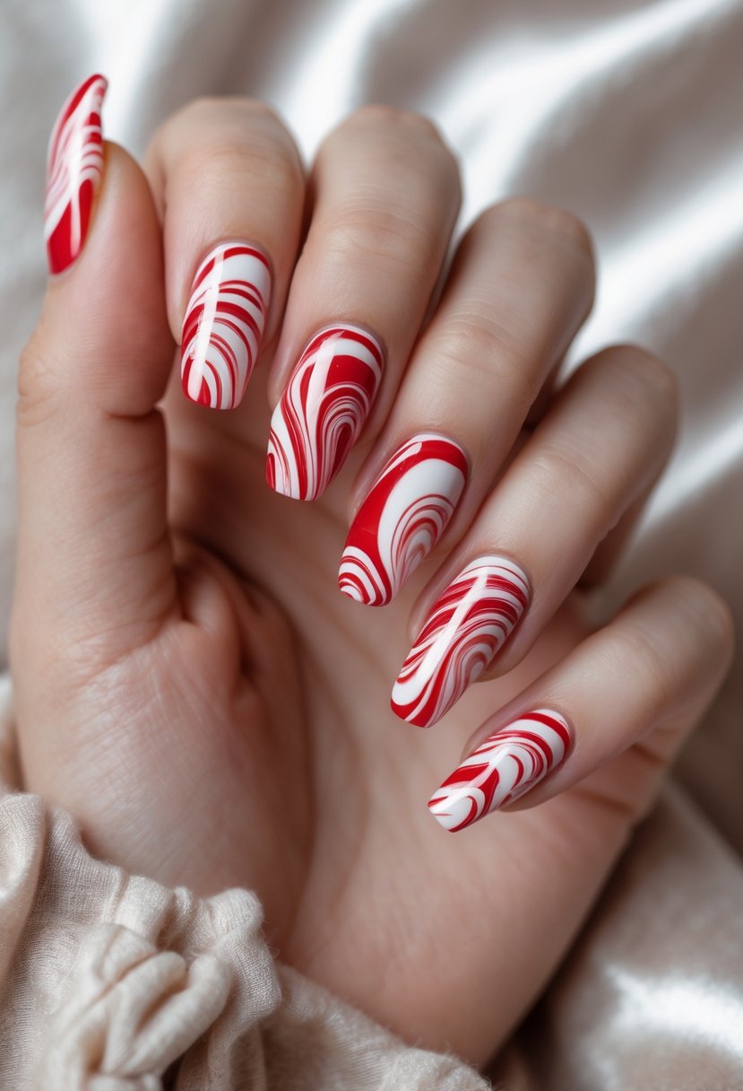Close-up of a hand with sixteen red and white swirled marble nails resembling candy canes.
