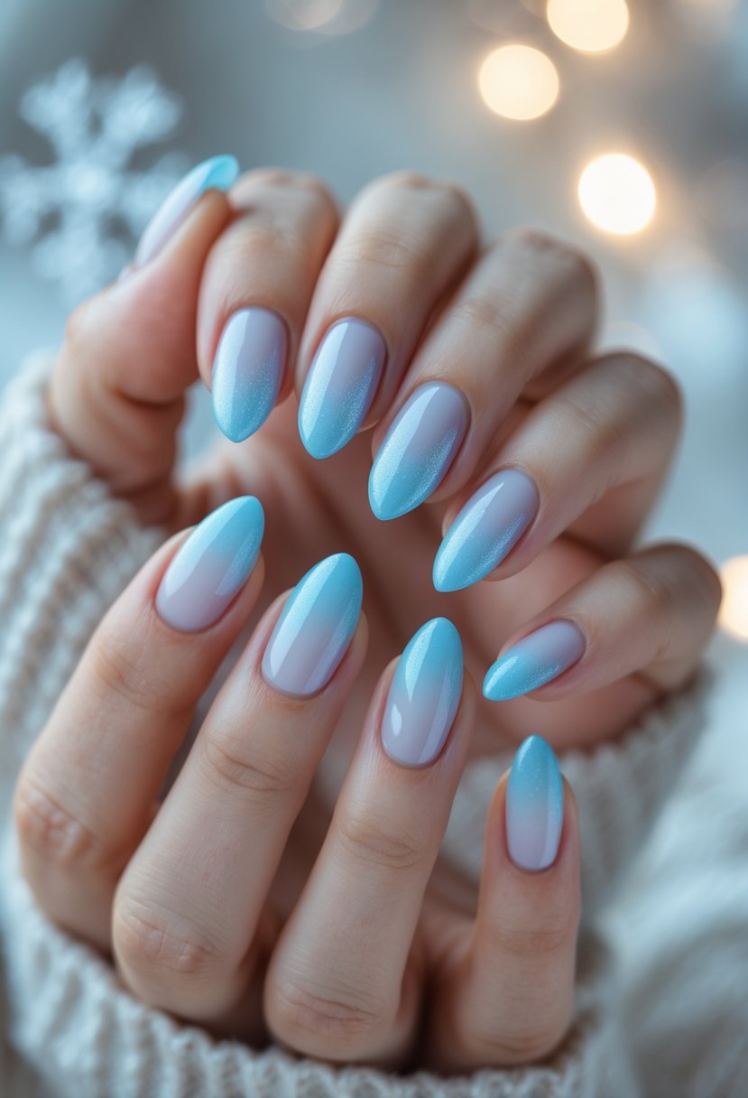Close-up of hands with frosted blue ombre nails against a soft background with subtle festive accents.