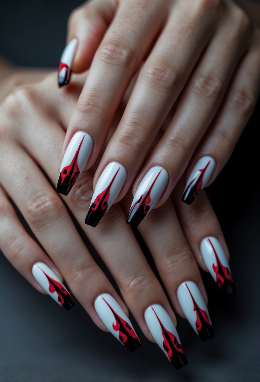 Close-up of hands with French tip nails featuring blood-red dripping designs on each nail.