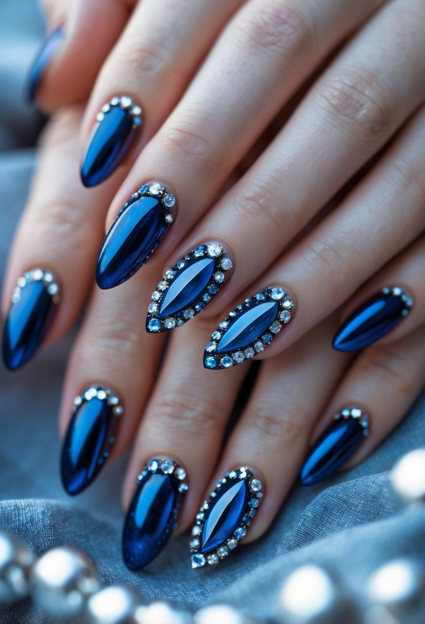 Close-up of hands with blue nails decorated with sparkling crystals.