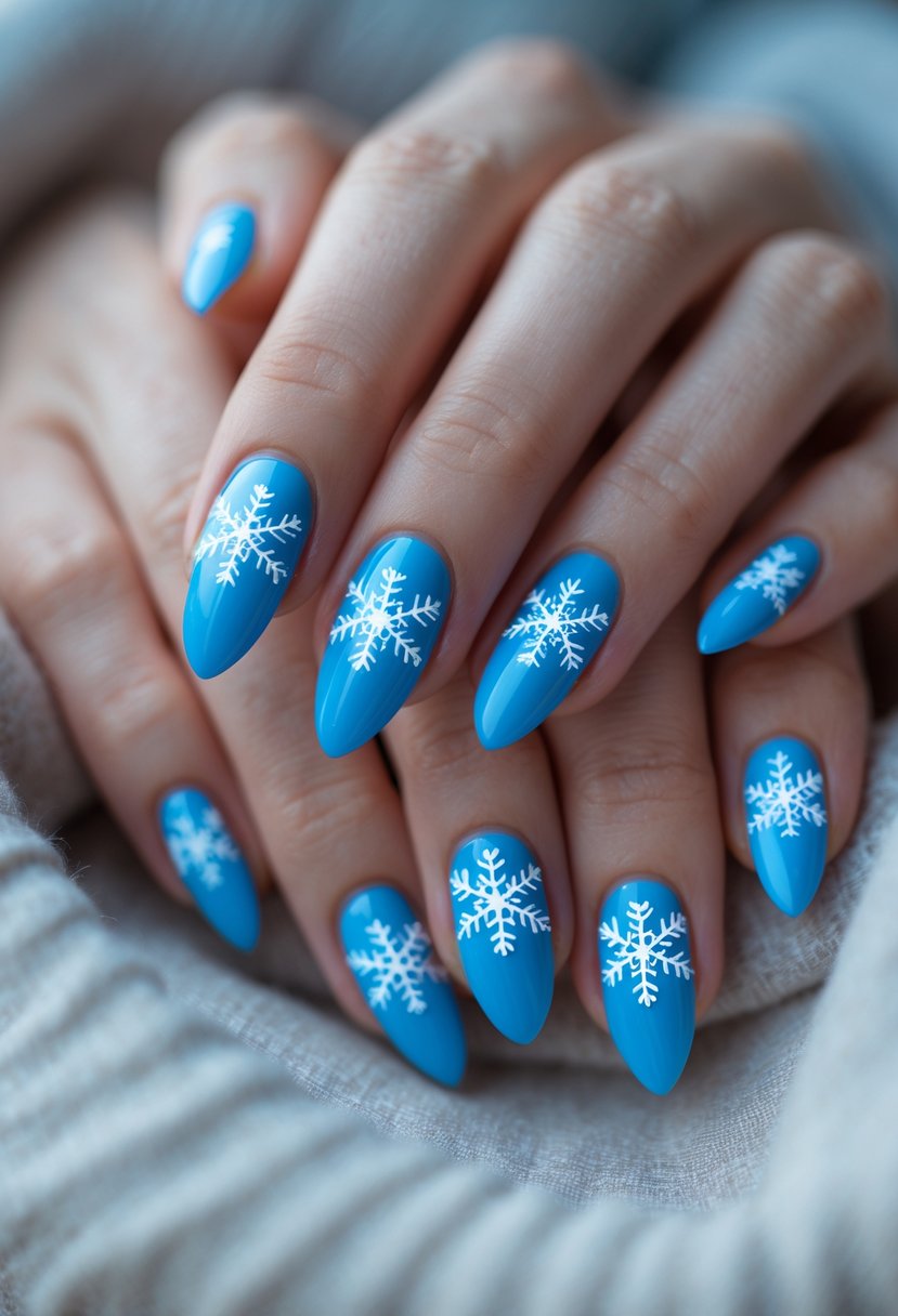 Close-up of hands with electric blue nails decorated with white snowflake designs.