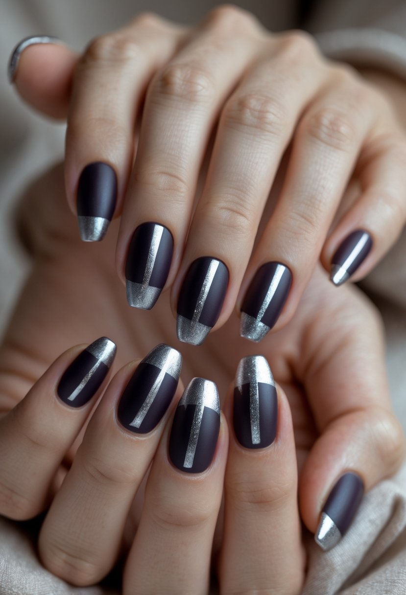 Close-up of hands with dark plum matte nails featuring metallic stripes.