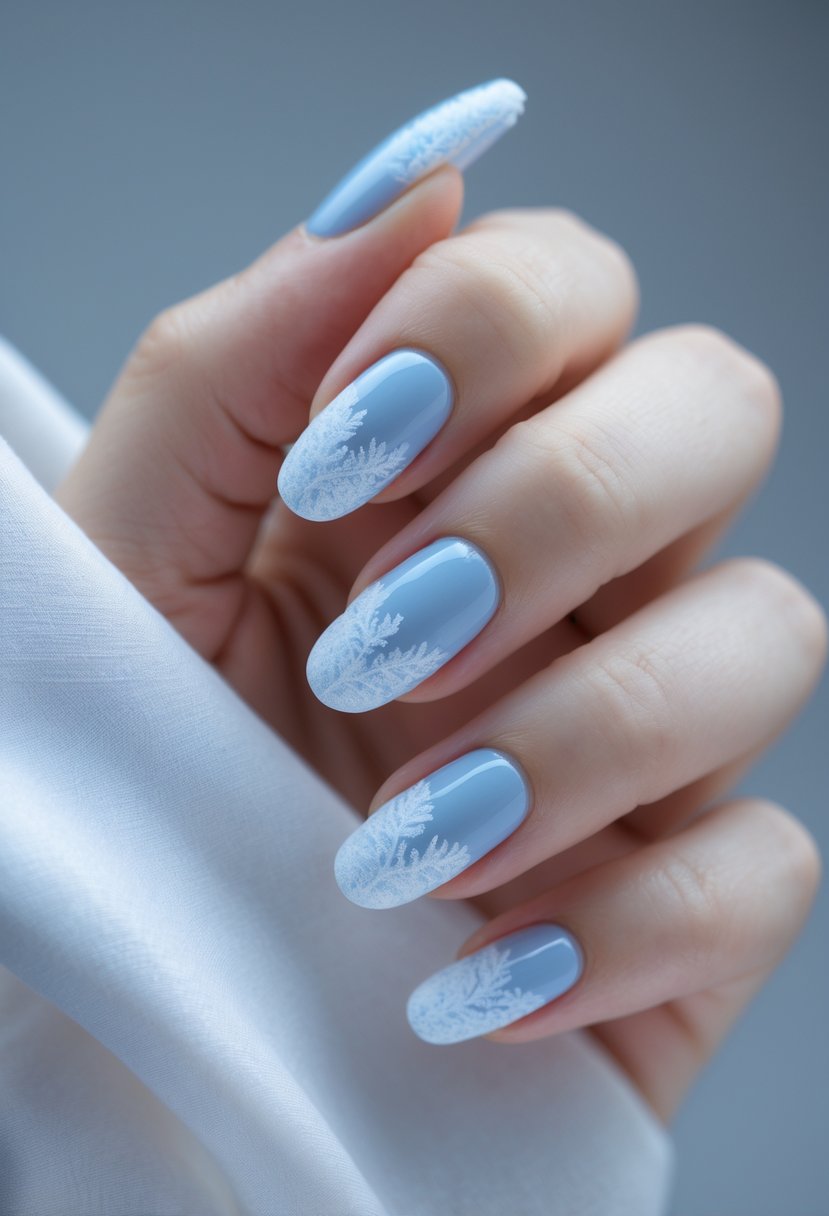 Close-up of a hand with light blue nails and frosted white tips.